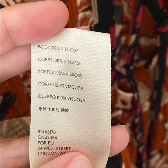 Free People Burnt Orange Black On The Edge Floral Romper - Picture 7 of 7